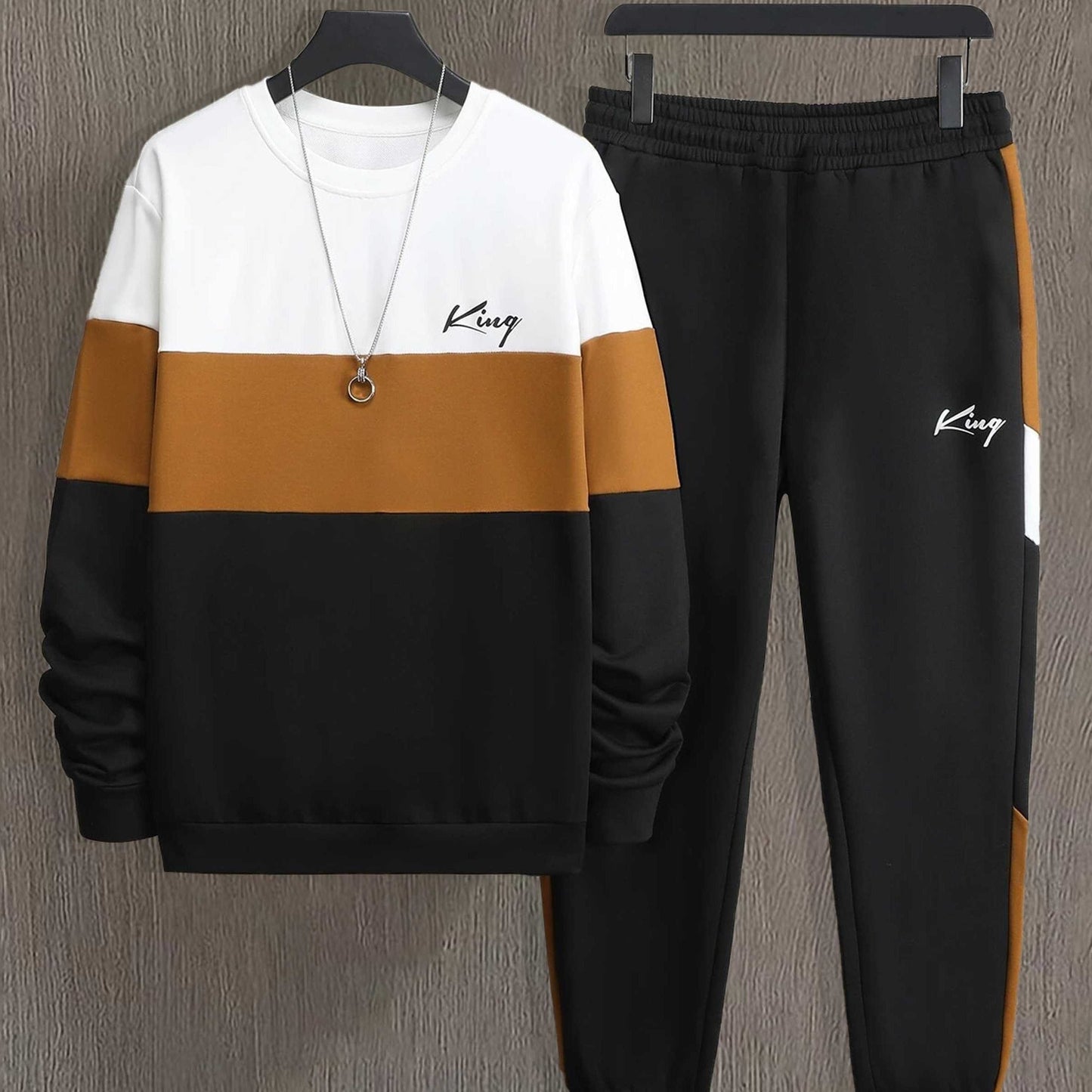 A Set of Men'S Color-Blocked Sportswear for Spring And Autumn, Featuring a Casual Print Long-Sleeve Crew Neck Sweatshirt And Drawstring Jogger Pants.