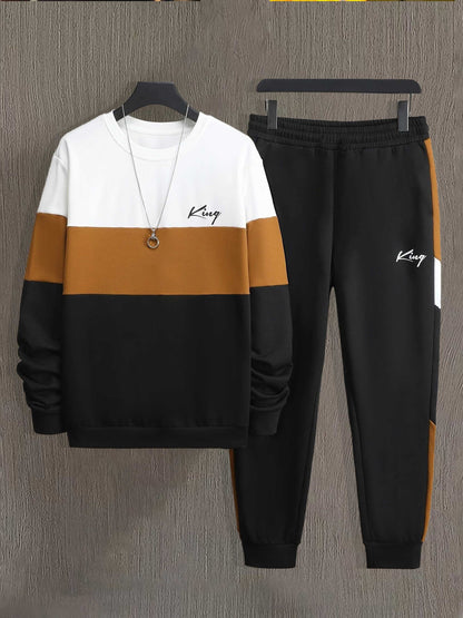 A Set of Men'S Color-Blocked Sportswear for Spring And Autumn, Featuring a Casual Print Long-Sleeve Crew Neck Sweatshirt And Drawstring Jogger Pants.