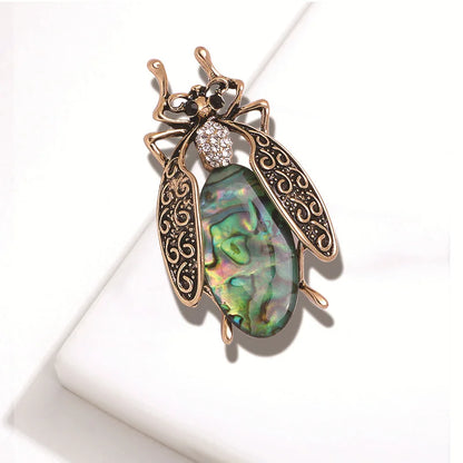 Cross Fashion Retro Insect Cicada Brooch Personalized Alloy Women's Rhinestone Cat's Eye Stone Gemstone Brooch